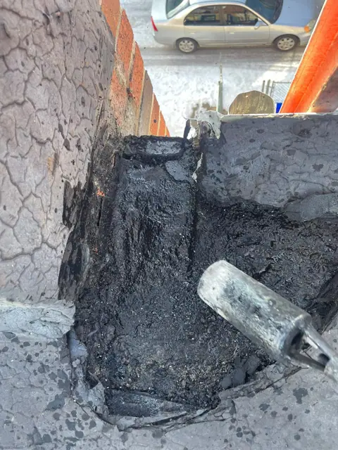 The opening after the old drain box was torn out