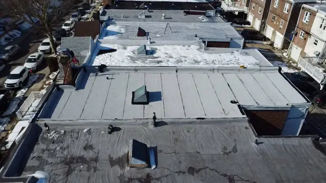 White granulated re-roof in Mayfair (posted February 18, 2026)