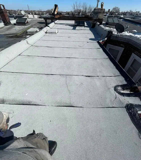 White granulated roof install in North Philly (posted March 1, 2026)